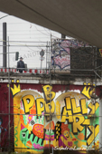 <b>BRL1019</b><br>Europa; Germania; Berlin; Graffiti; Street art; Revaler str 99; Revaler Straße; Friedrichshain; Factory; Man; Walk; Bridge