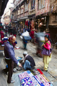 <b>NPL1003</b><br>Nepal; Kathmandu; Siddhidas Marg; Street; People; Bazaar; Walking; Morning; Shop; Purchase; Seller