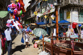 <b>NPL1010</b><br>Nepal; Kathmandu; Siddhidas Marg; Street; People; Bazaar; Purchase; Kid; Girl; Father; Daughter; Walk; Balloons