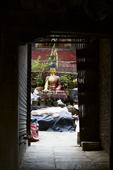 <b>NPL1016</b><br>Nepal; Kathmandu; Buddhist; Buddha; Courtyard; Square; Street; Statue; Sculpture; Art; Plants