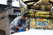 <b>NPL1023</b><br>Nepal; Kathmandu; Street; People; Painter; Stupa; Buddha Eyes; Buddhism; Work; Paint; Man