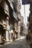 <b>NPL1030</b><br>Nepal; Kathmandu; Street; People; Walk; Shop; House; Building; Empty; Motorbike; Neighborhood