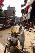 <b>NPL1086</b><br>Nepal; Kathmandu; Bhaktapur; Street; People; Man; Seller; Bicycle; Fruit; Village; Store; Shop; Building; House