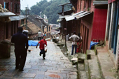 <b>NPL1093</b><br>Nepal; Kathmandu; Bhaktapur; Changunarayan; Changu Narayan; Village; Boy; Run; Walk; Street; Building; House; People