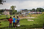 <b>NPL1101</b><br>Nepal; Kathmandu Valley; Village; Nagarkot; Friend; Kids; Play; Game; Volleyball; Building; House; People; Match