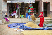<b>NPL1125</b><br>Nepal; Kathmandu Valley; Panauti; Shop; Store; Seller; Granmother; Rest; Woman; People; Work; Rice; Dry; Village; Street