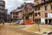 <b>NPL1127</b><br>Nepal; Kathmandu Valley; Panauti; Village; People; Rice; Dry; Street; Building; House; Woman; Work