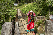 <b>NPL1169</b><br>Nepal; Pokhara; River; Bridge; People; Woman; Carry; Walk; Nature; Forest; Village