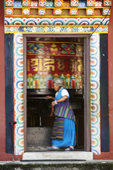 <b>NPL1174</b><br>Nepal; Pokhara; Tibetan; Refugee; Camp; Tashi Palkhel; Buddhism; Monk; Woman; Prayer wheel