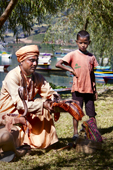 <b>NPL1176</b><br>Nepal; Pokhara; Lake; Kid; Show; Snake charming; People; Cobra; Snake; Performance; Phewa