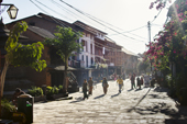 <b>NPL1241</b><br>Nepal; Tanahun; Bandipur; House; Street; Building; Village; People; Walk; Evening; Shadow; Flower